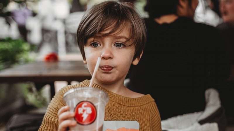 boy with soda - childhood obesity