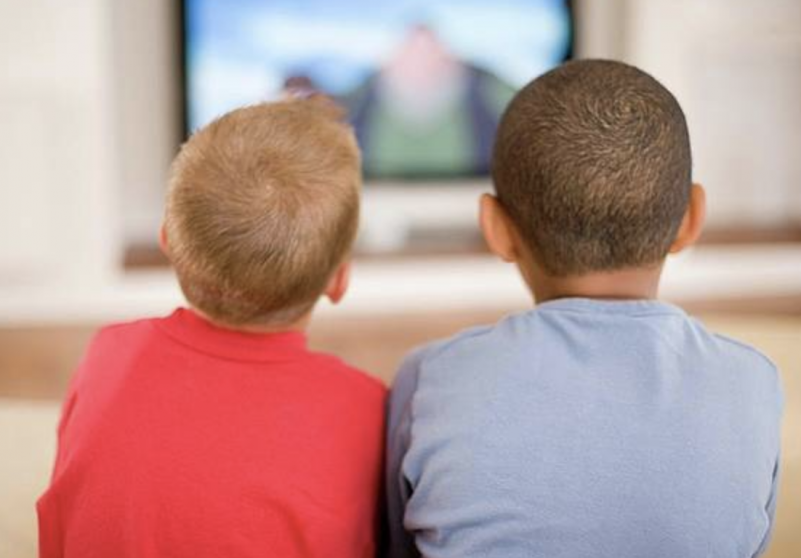 Two young boys watching tv back view - Just Do It Already