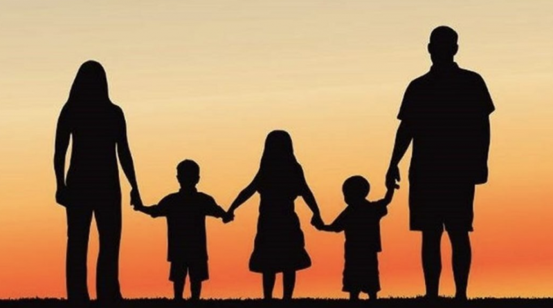 Silhouette of family holding hands - money well spent