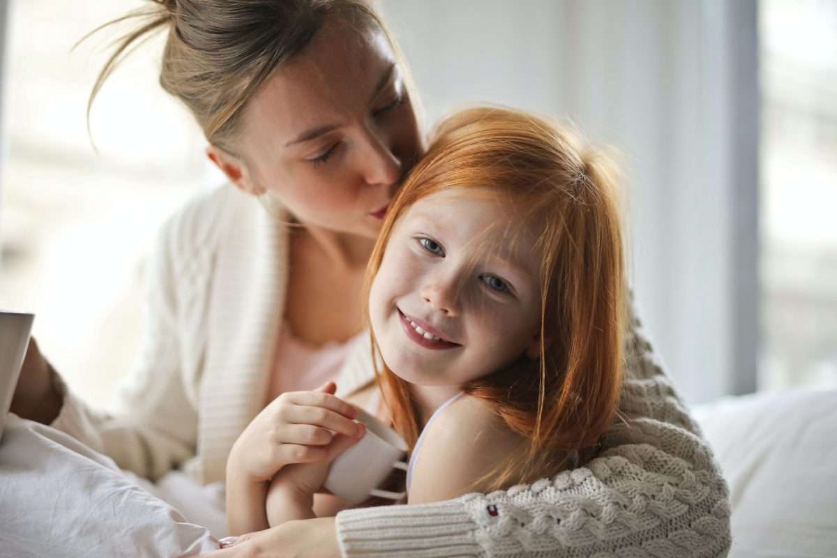 a-mother-kissing-her-child-health tips for kids