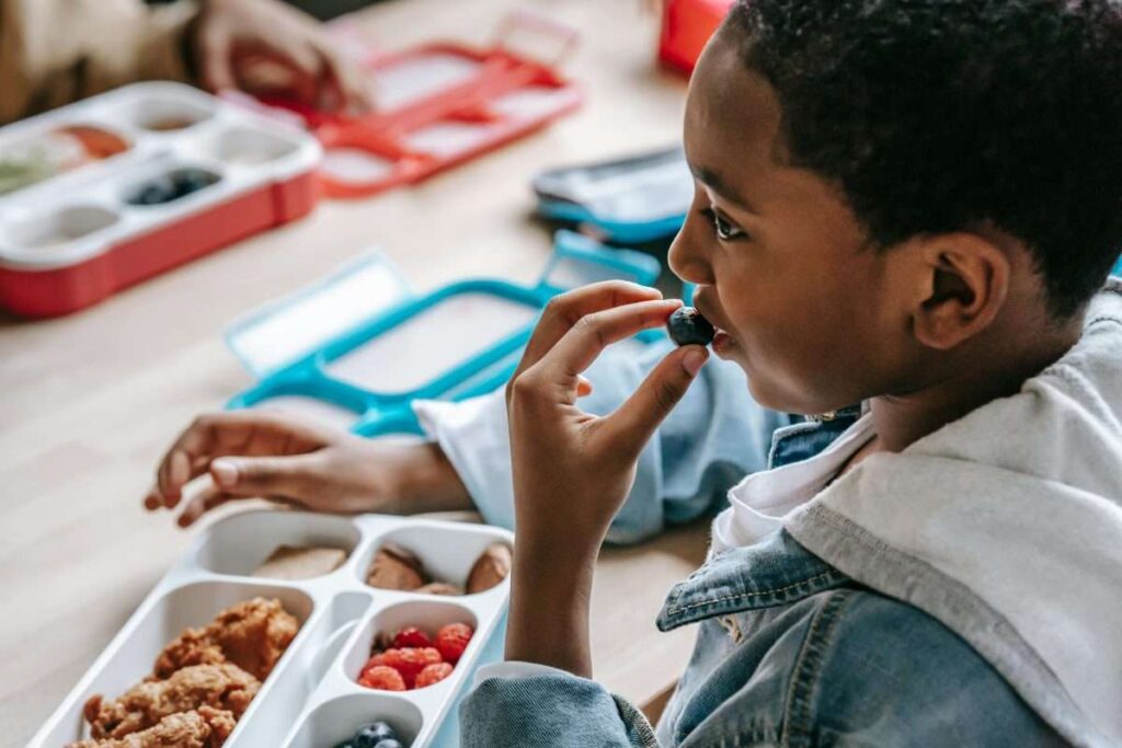 boy eating lunch at school