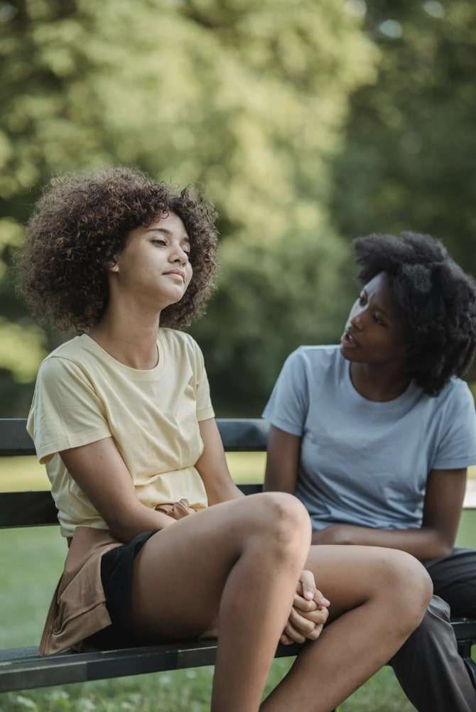 Mother talking with teen child
