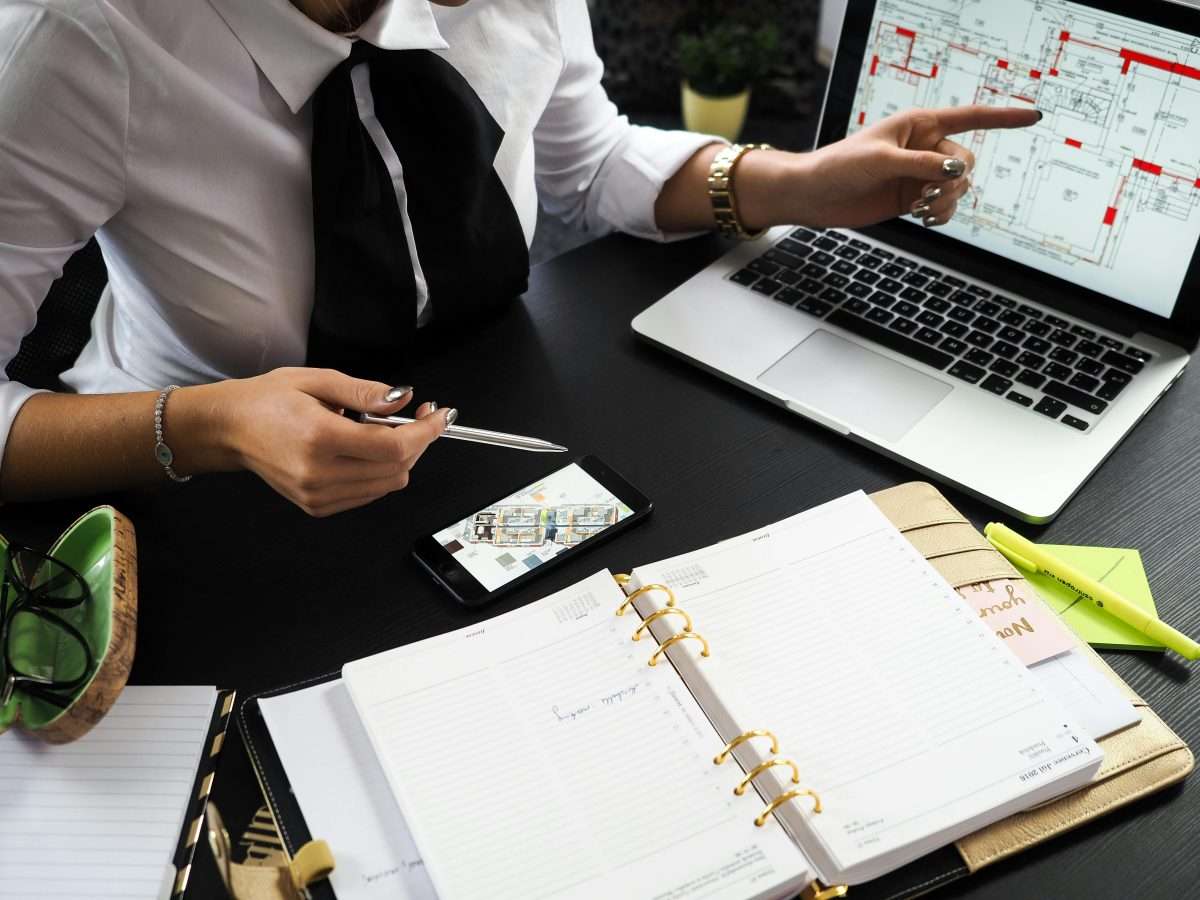 woman at busy desk