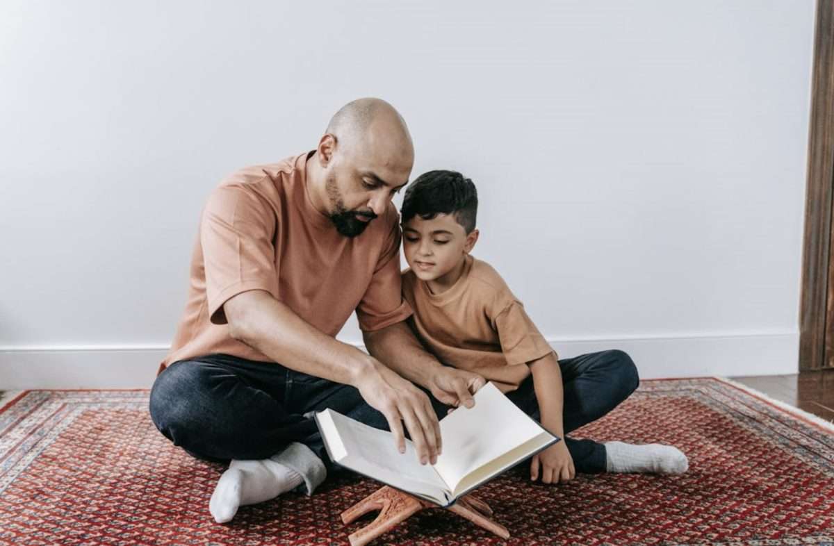Father and son reading
