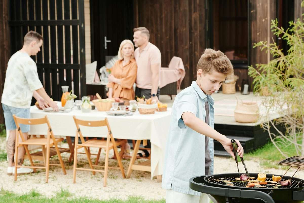 A Boy Grilling Food