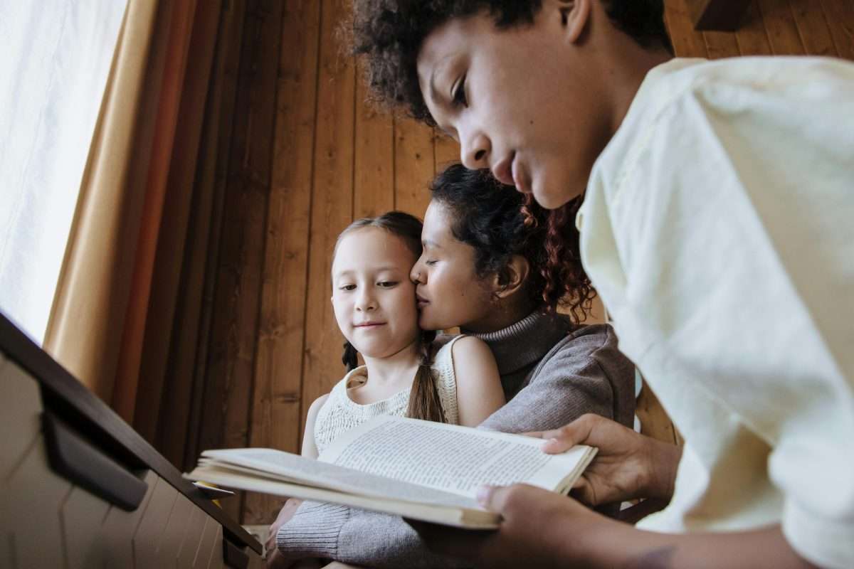 Brother and Sister Learning With Their Mother