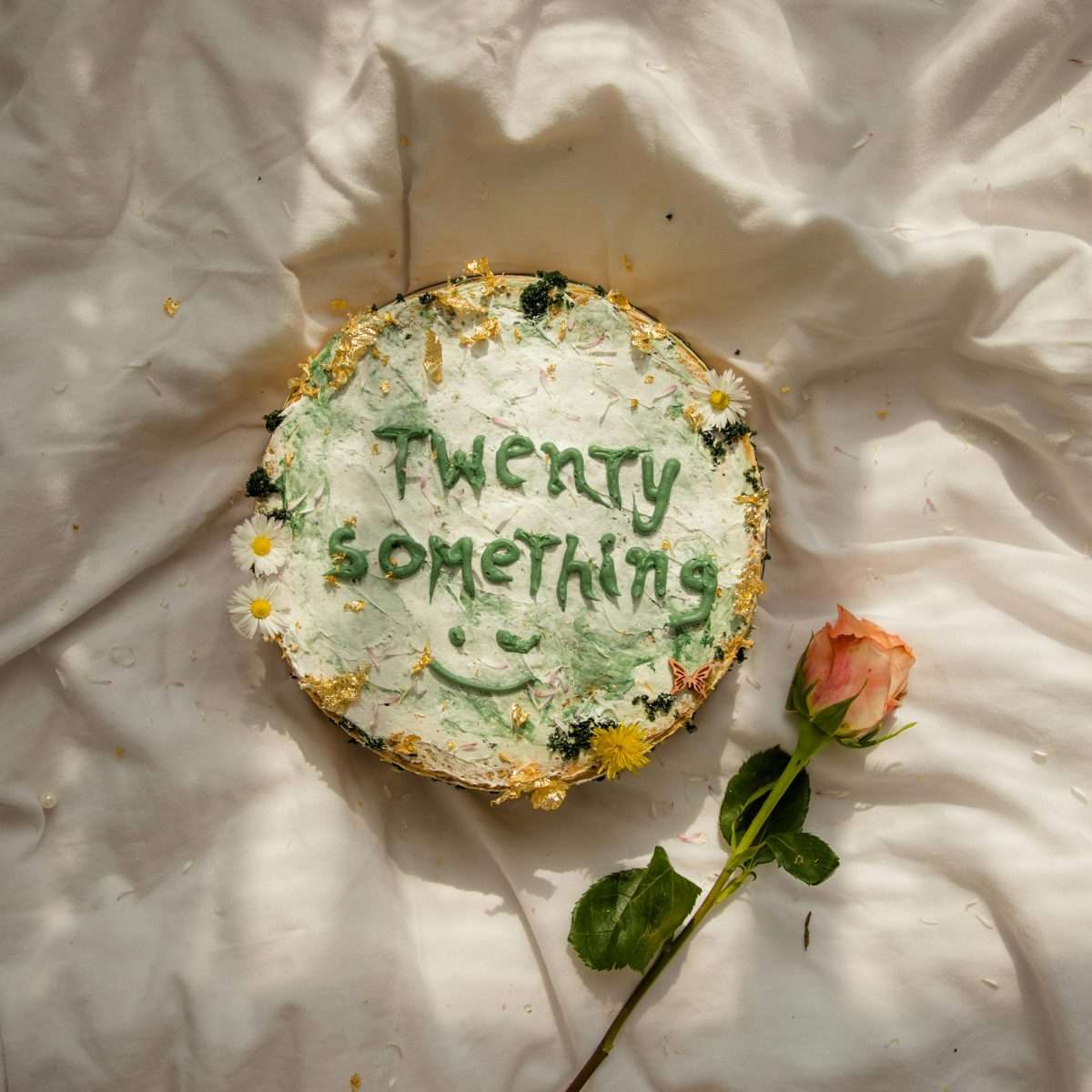 birthday cake with flowers and twentysomething text